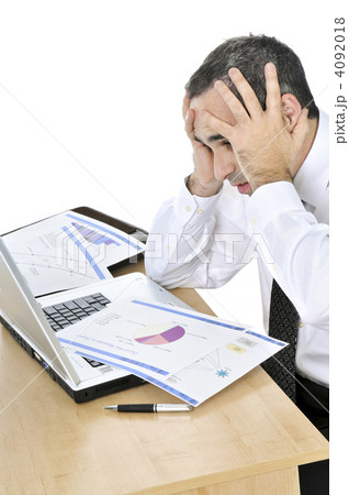 Businessman at his desk on white background Businessman at his desk on white background 4092018