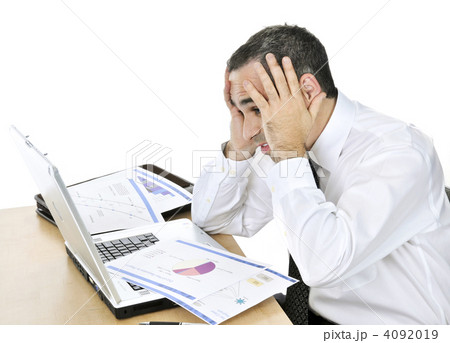 Businessman at his desk on white background Businessman at his desk on white background 4092019