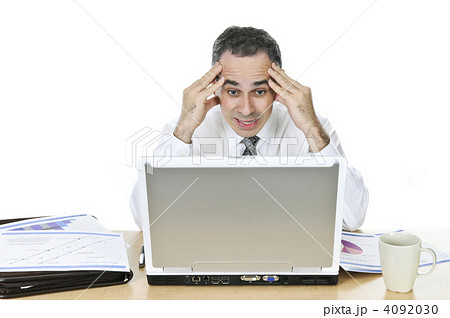 Businessman at his desk on white background Businessman at his desk on white background 4092030