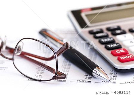 Tax calculator pen and glasses 4092114