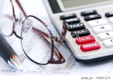 Tax calculator pen and glasses 4092124