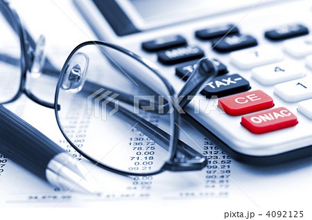 Tax calculator pen and glasses 4092125