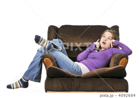 Teenage girl talking on a phone Teenage girl talking on a phone 4092684