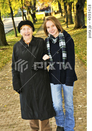 Granddaughter walking with grandmother Granddaughter walking with grandmother 4093418