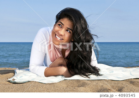 Young native american woman at beach Young native american woman at beach 4093545