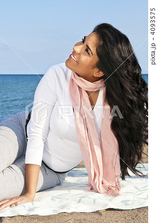 Young native american woman at beach 4093575