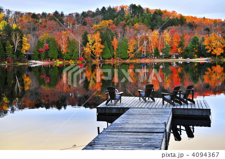 Wooden dock on autumn lake 4094367