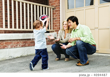 Family playing with soccer ball Family playing with soccer ball 4094487