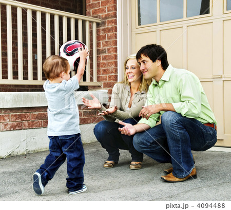Family playing with soccer ball Family playing with soccer ball 4094488