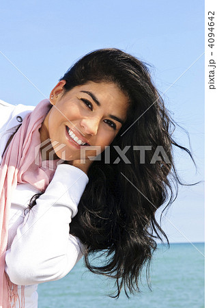 Beautiful young woman at beach 4094642