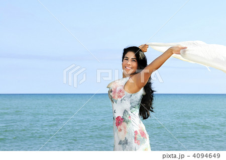 Beautiful young woman at beach Beautiful young woman at beach 4094649