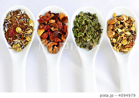 Assorted herbal wellness dry tea in spoons 4094979