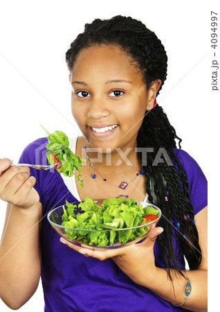 Girl having salad 4094997