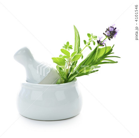 Healing herbs in mortar and pestle 4101546
