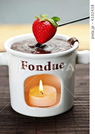 Strawberry dipped in chocolate fondue 4102438