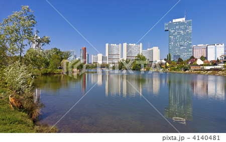 Skyline Uno City Vienna in summer at the Kaiserwasser Skyline Uno City Vienna in summer at the Kaiserwasser 4140481