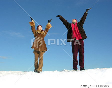 couple with hands up. winter 4140505