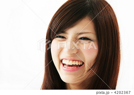 爆笑する女性の写真素材