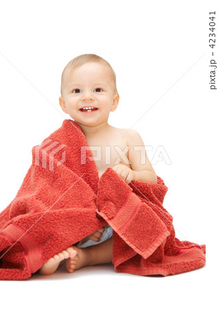 smiling baby in towel 4234041