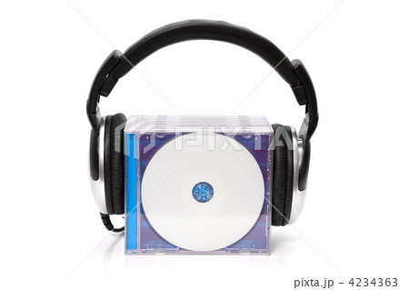 headphones with stack of cds headphones with stack of cds 4234363