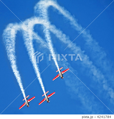 three airplanes in formation on airshow 4241784