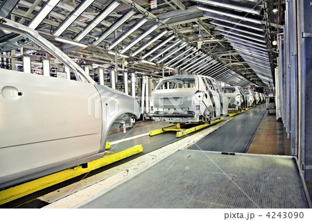 cars in a row at car plant 4243090