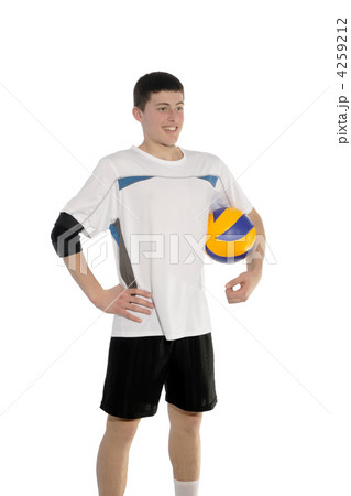 Volleyball player with the ball on a white 4259212