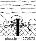 wired fence with barbed wires 4270372