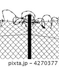 wired fence with barbed wires 4270377