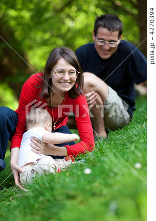 Happy family of three having fun together 4270394