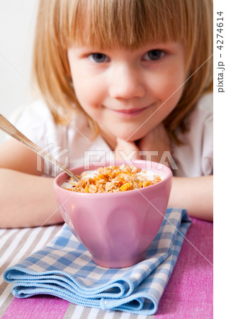 Little girl in breakfast table 4274614