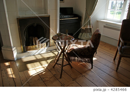 At a fireplace At a fireplace 4285466