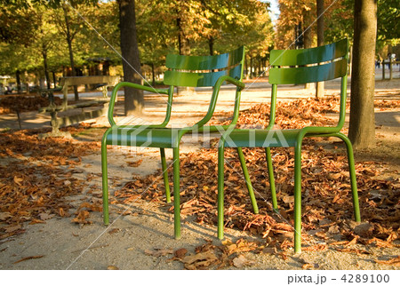 Autumn in Paris. Typical parisian park chairs in the Luxembourg Autumn in Paris. Typical parisian park chairs in the Luxembourg 4289100
