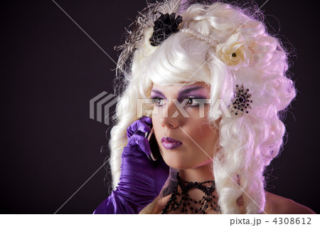 Funny portrait of burlesque woman speaking on phone 4308612