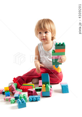 Funny boy playing with blocks Funny boy playing with blocks 4309201