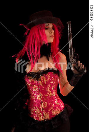 Cabaret girl in pink corset holding gun 4309335