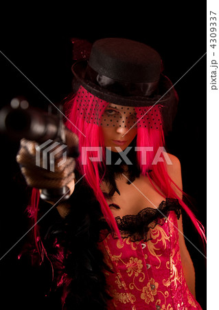 Attractive girl pointing gun at camera 4309337