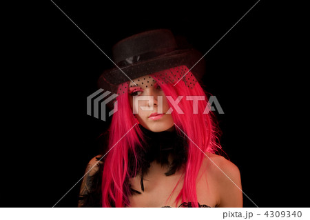 Upset girl with pink hair and make-up Upset girl with pink hair and make-up 4309340