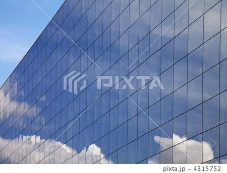Modern building and blue sky reflection Modern building and blue sky reflection 4315752