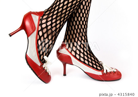 Female legs in red shoes 4315840