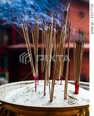 Burning incense sticks Burning incense sticks 4327739
