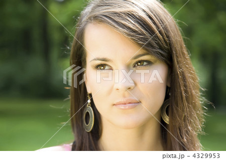 Beauty Woman On The Green Background Beauty Woman On The Green Background 4329953