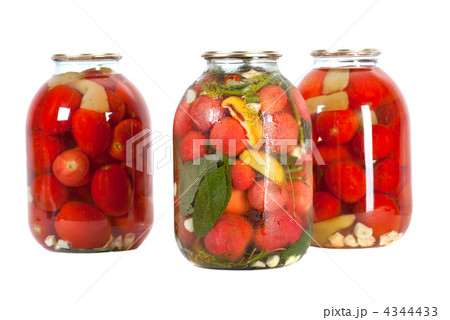 red tomatoes in a glass jar 4344433