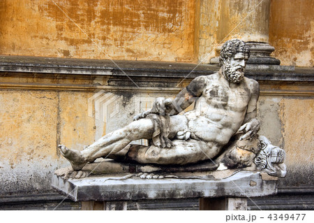 Sculpture of the man semilaying on a bench Sculpture of the man semilaying on a bench 4349477