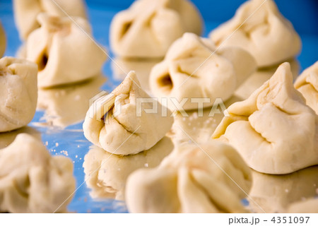 Raw homemade cinnamon cookies at tray ready for baking. Shallow 4351097