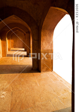 Ancient architecture. Corridor with arches constructed from terr 4351606