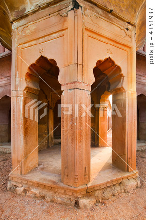 Part of ancient architecture ruins. Columns with arches construc 4351937