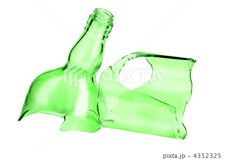 Parts of broken green bottle isolated on white background 4352325