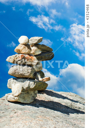 Two stone towers. Stack of meditation zen stones over blue sky 4352468