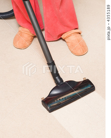 Housewife vacuum a carpet Housewife vacuum a carpet 4355189